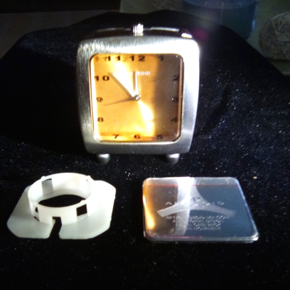 Silver Android Oko USA Antique Clock